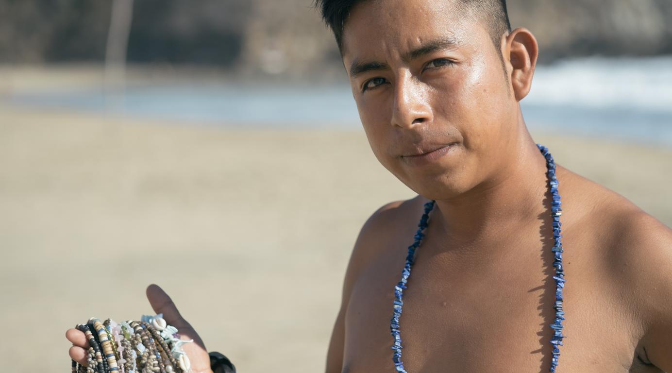 Miguel, Strandverkäufer in Mexiko. Bild: Simon und Fränzi von Um die Weltreise.